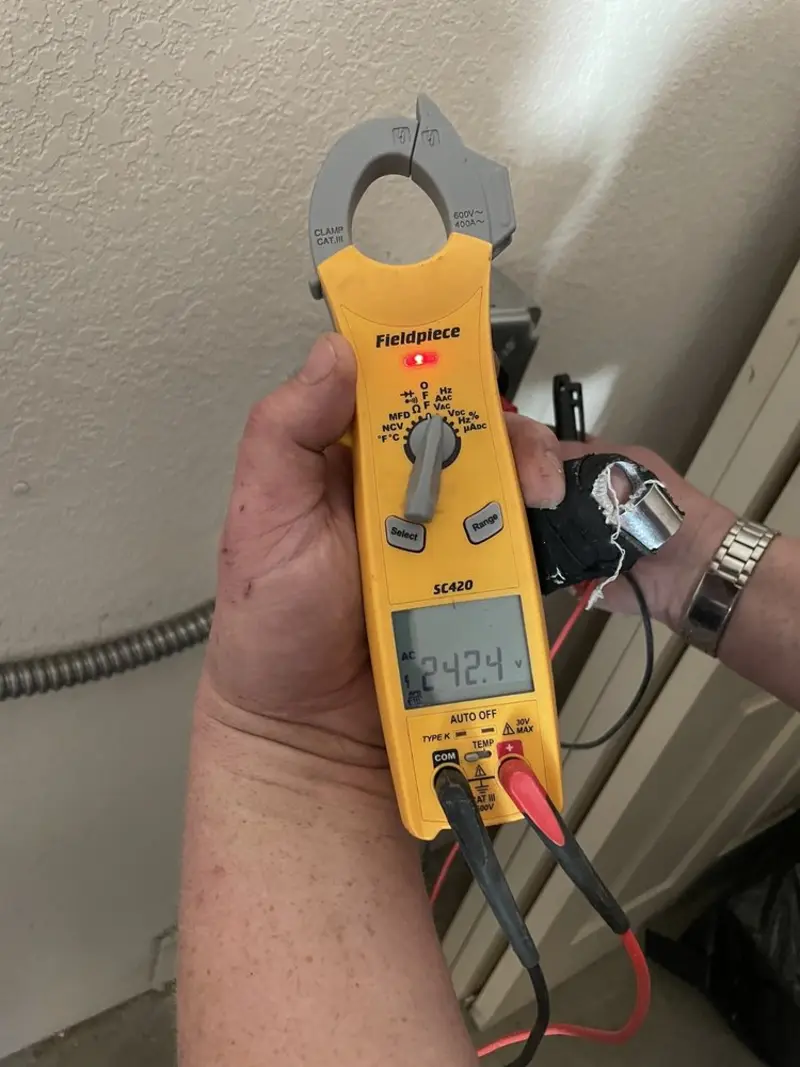 Voltage testing with clamp meter during Electrical Installation Services in Deer Park